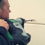 J. Matheson helping us drill into the cement