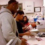 Vernon Davis signing hella items we tucked away in the back room