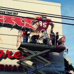 Vernon Davis autographing our mural
